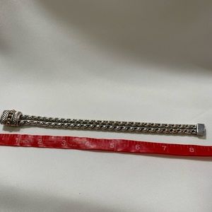 Silver braided rope bracelet with gold embellishments